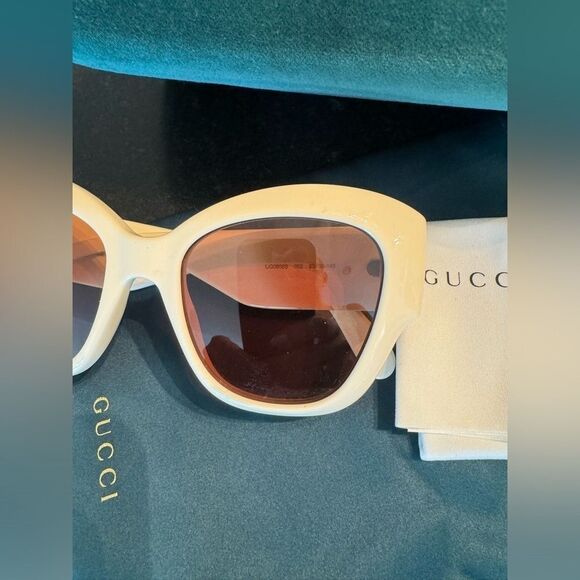 Gucci Sunglasses Acetate in Ivory oversized square frames arms have gold GG logo main image 3